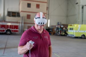 Instructor Dennis Cole demonstrates VR technology